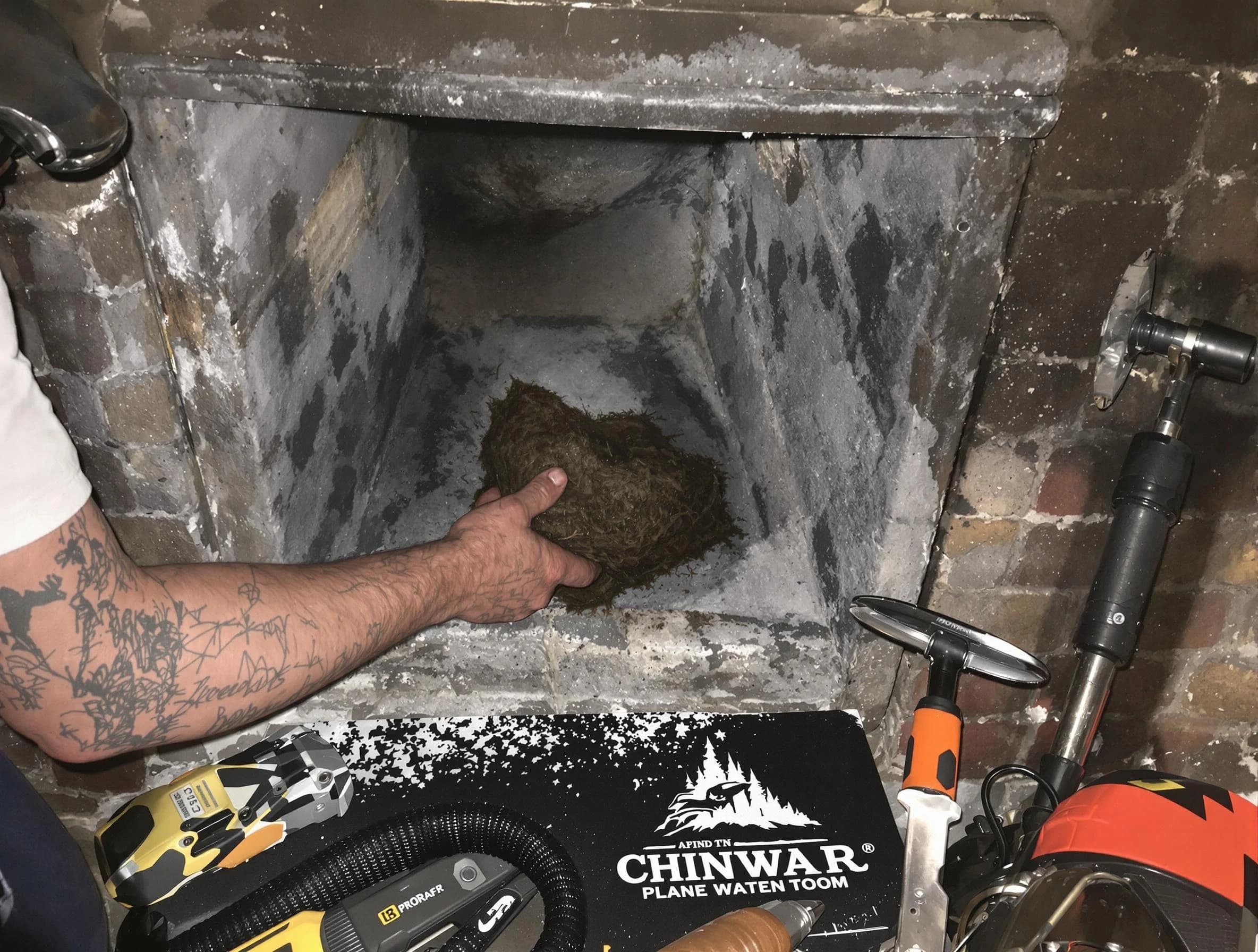 Allegheny Chimney Sweep safely removing debris and screening chimney in Allegheny, PA